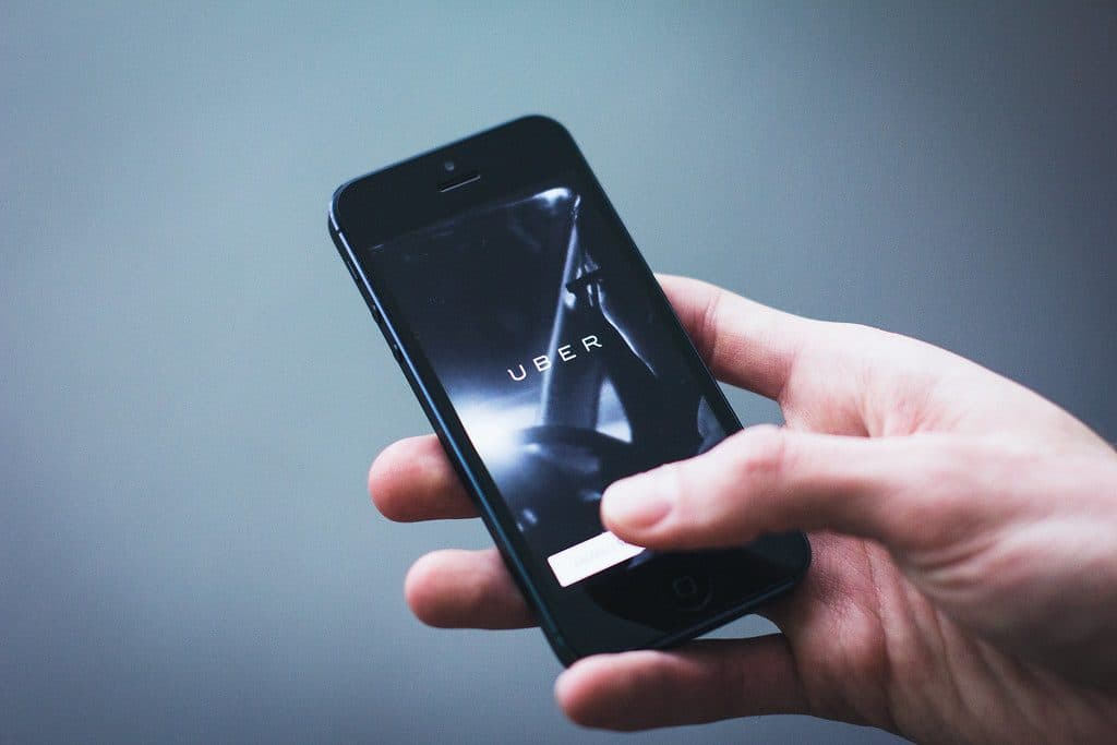 Checking a calendar app on a smartphone